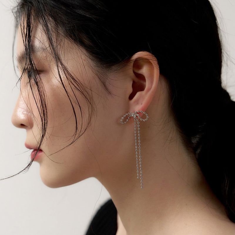 geegee(ジジ)の「holi long ribbon earring - silver(Accessories)」