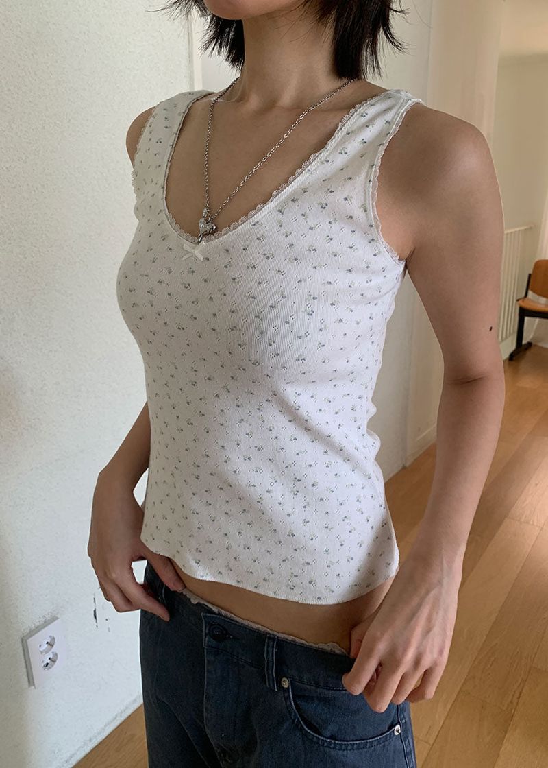 eon（イオエン）の「BLOSSOM PUNCHING SLEEVELESS（Tops）」