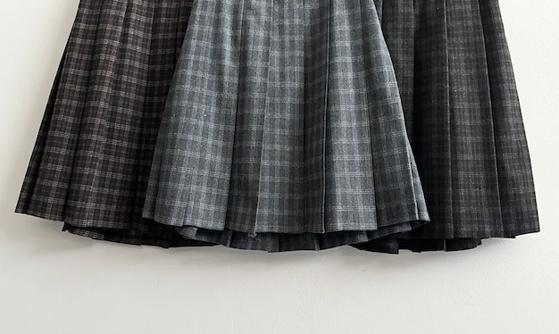Bomi A-line pleated check midi skirt 