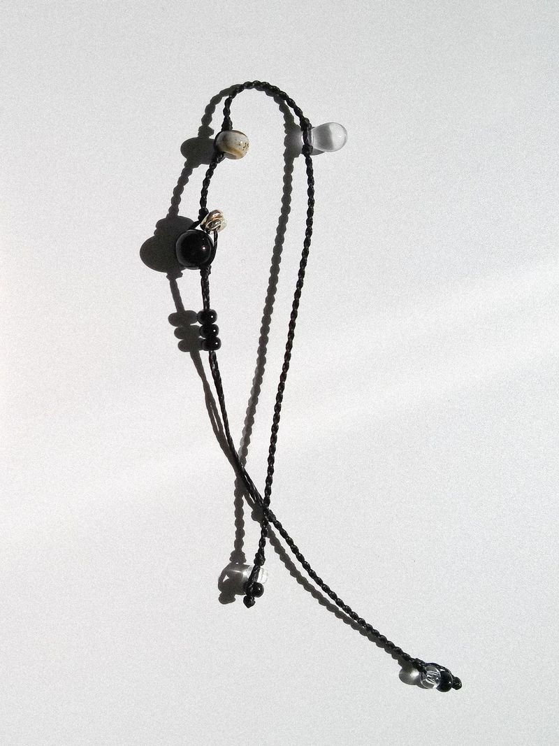 mOzi（モジ）の「フットプリントオブサンド（アクセサリー）」