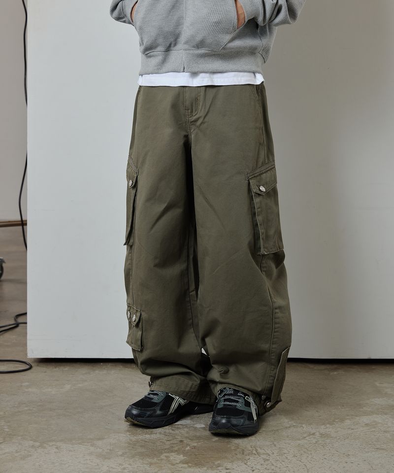 ODDSTUDIO（オッドスタジオ）の「Diagonal Cut Cargo Pocket Cotton Pants - KAHKI（Pants）」