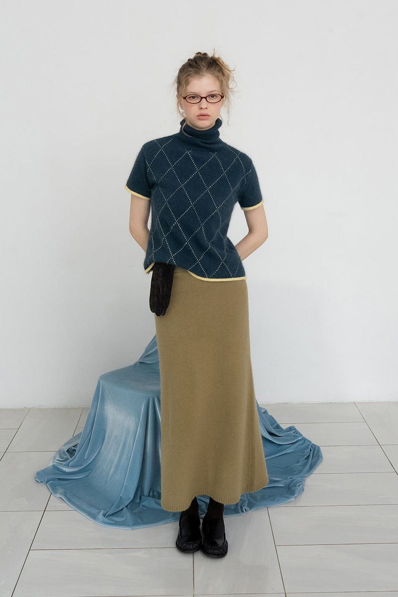 WITHOUTSUMMER（ウィズアウトサマー）の「Raccoon knit skirt_olive（Skirts）」