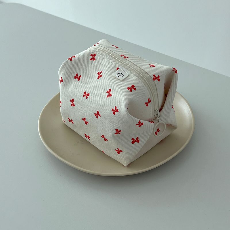 RED RIBBON ZIPPER POUCH