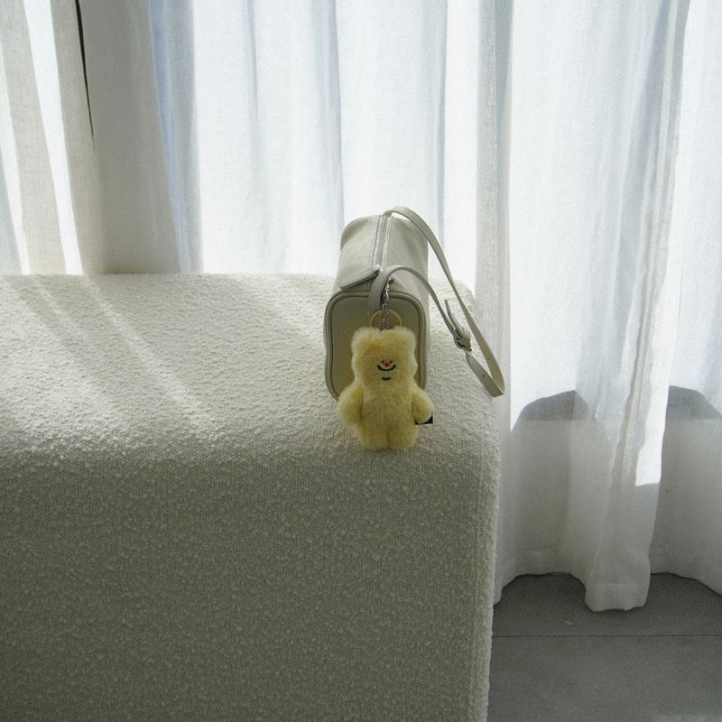 tuteogi yellow doll keyring
