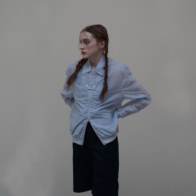 UBEIGE(ユーベイジ)の「Blue Nylon Shrring Jacket(Jackets/Outerwear)」