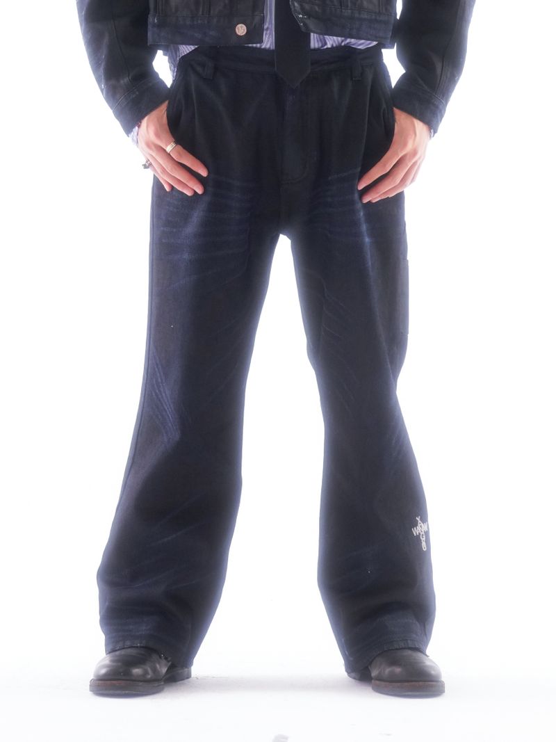 COATED KNIFE-SCRAPED HAND-WIPED DISTRESSED BOOTCUT JEANS