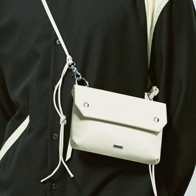 piping leather strap flap bag & utility key ring ivory