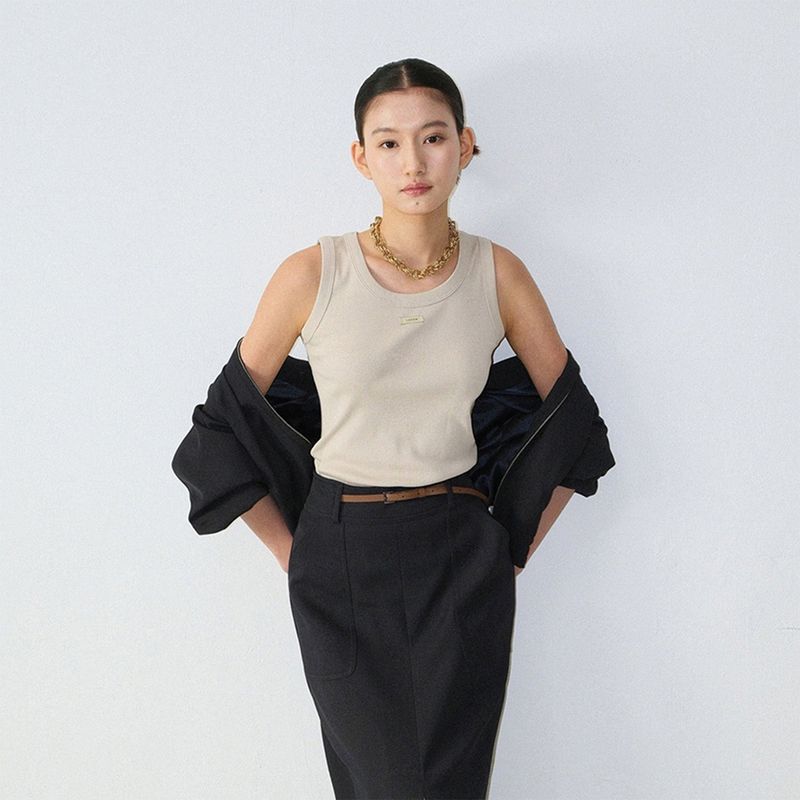 Loventina（ラヴェンティナ）の「Cotton Label Sleeveless_Beige（Tops）」
