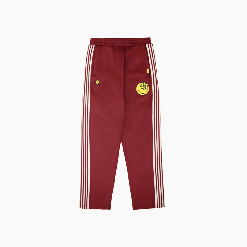 Water The Plant（ウォーターザプラント）の「SMILEYWORLD® BASIC TRACK PANTS | BURGUNDY（Pants）」