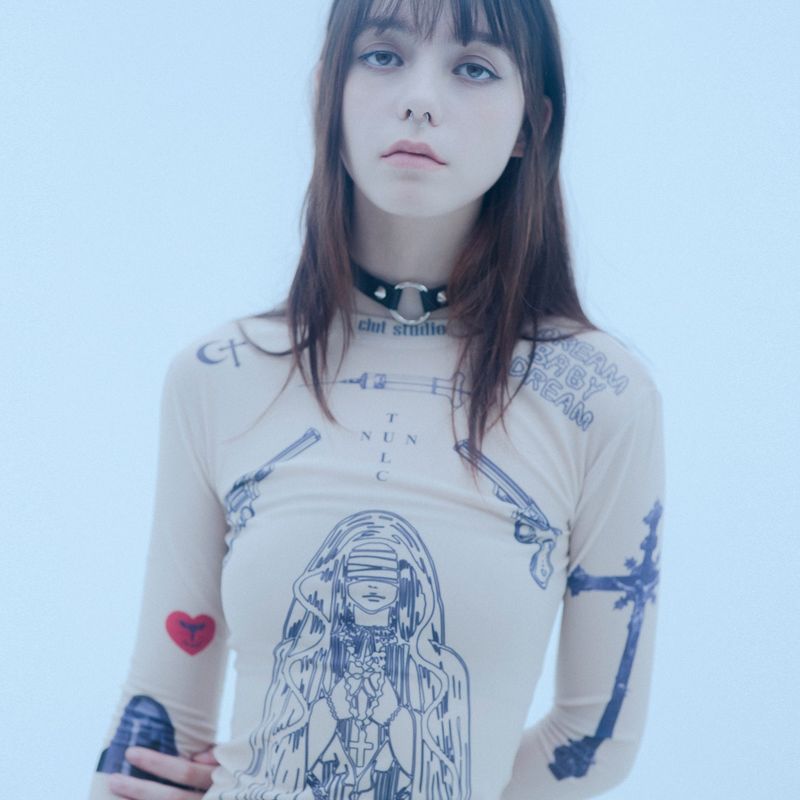 CLUT STUDIO(クラットスタジオ)の「0 3 nun with guns tatto top(Tops)」