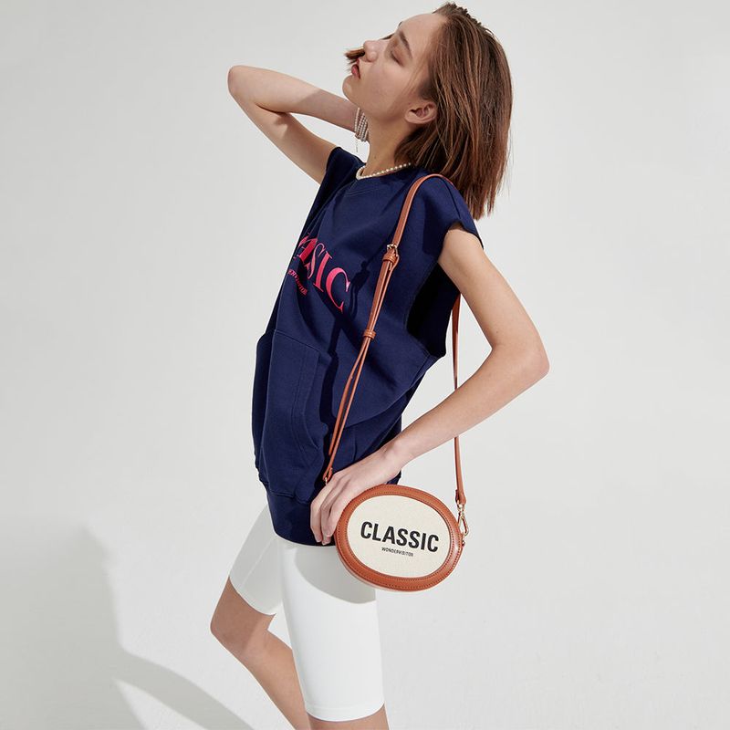 Classic oval mini cross bag [Brown]
