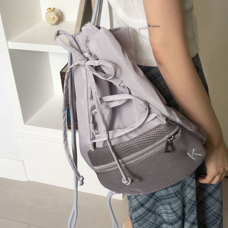 WONDER WONDER(ワンダーワンダー)の「Yar Nylon Balecore Strap Mesh Pocket String Backpack(Bags)」