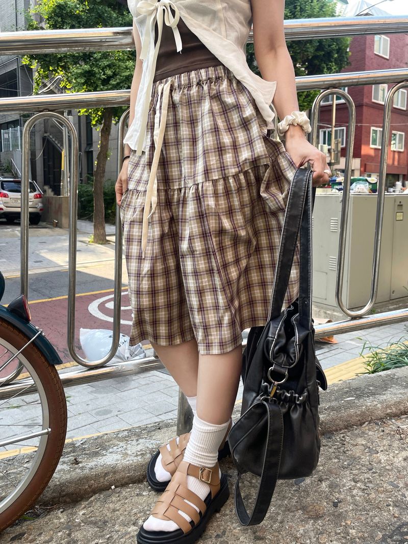 heenytsuki（ヒニツキ）の「Mori Checkered Midi Skirt（Skirts）」