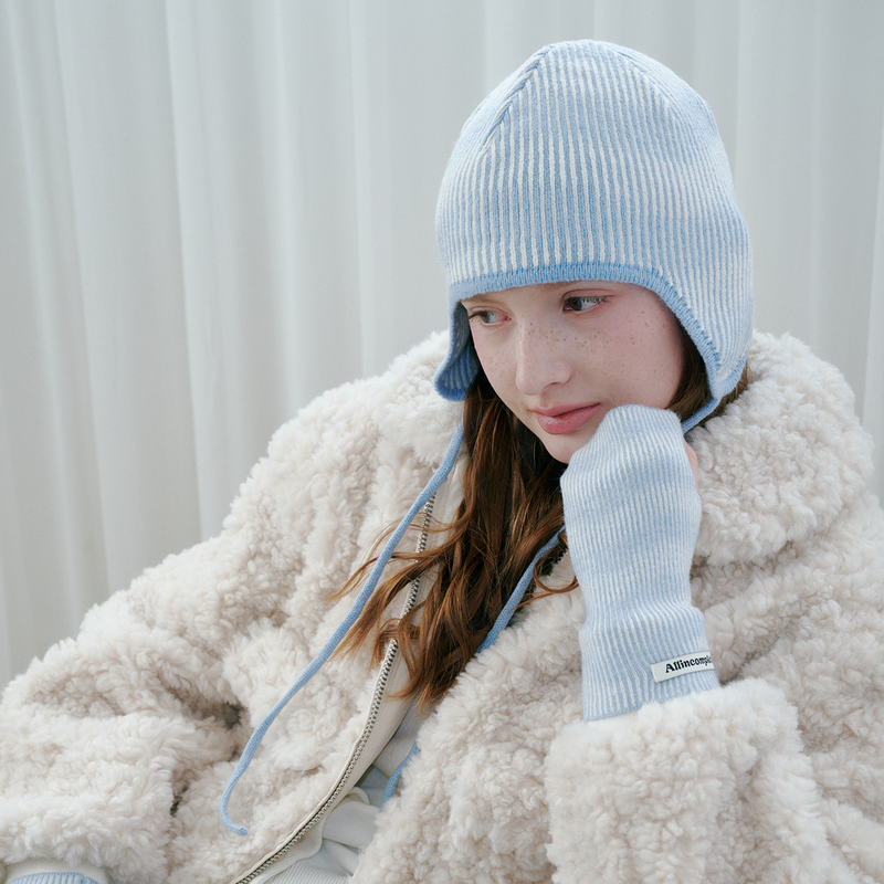 ALLINCOMPLETE（オールインコンプリート）の「Moire Wave Earflap Beanie (Sky Blue)（Hats）」