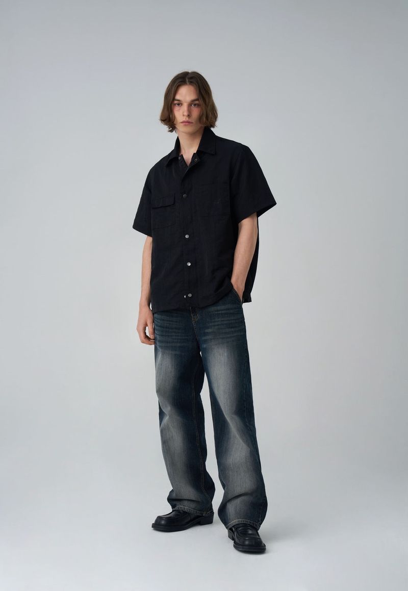 BACK BUTTON WIDE DENIM PANTS
