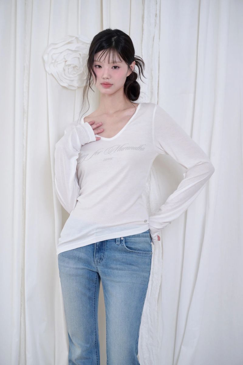 ZANNE（ザンヌ）の「リナシアーワイネックシャーリングロングスリーブティー (3 colors)（トップス）」
