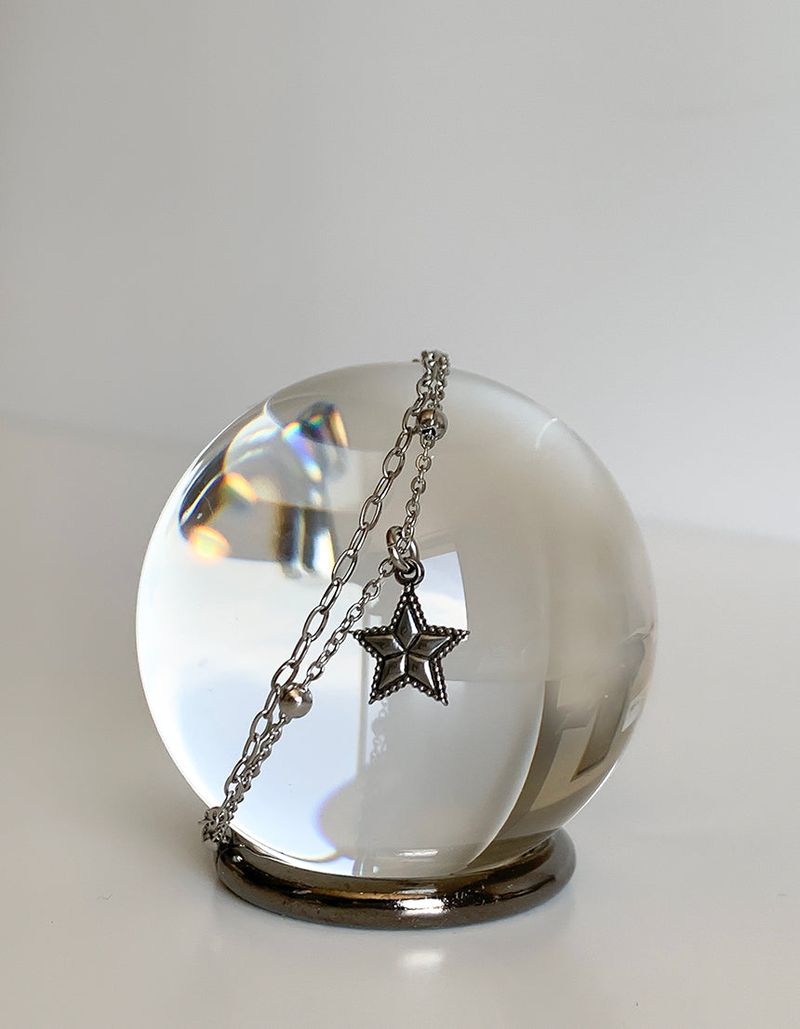 Two chain layered star bracelets