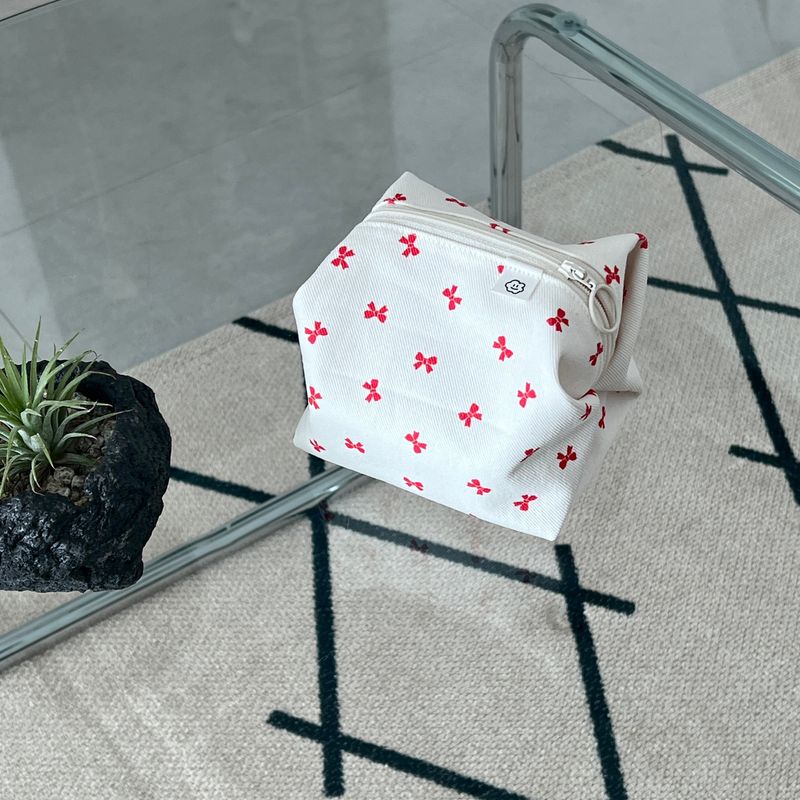 RED RIBBON ZIPPER POUCH
