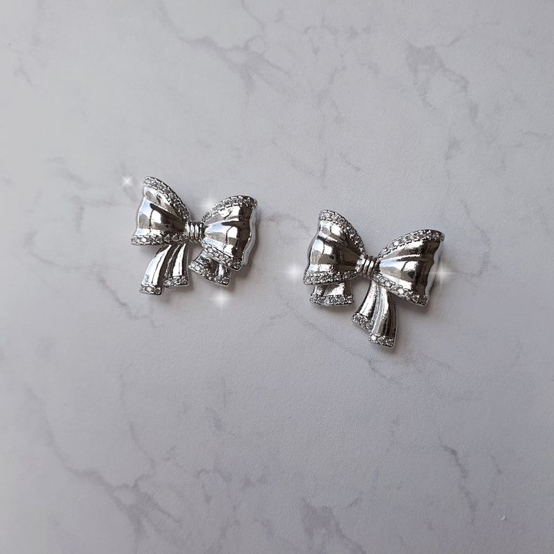 [ILLIT Wonhee Piercing] Puffy Ribbon Piercing - Silver Color