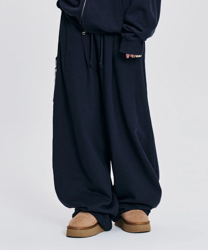mahagrid（マハグリッド）の「mah LOGO CHECK SWEAT PANTS_NAVY（Pants）」