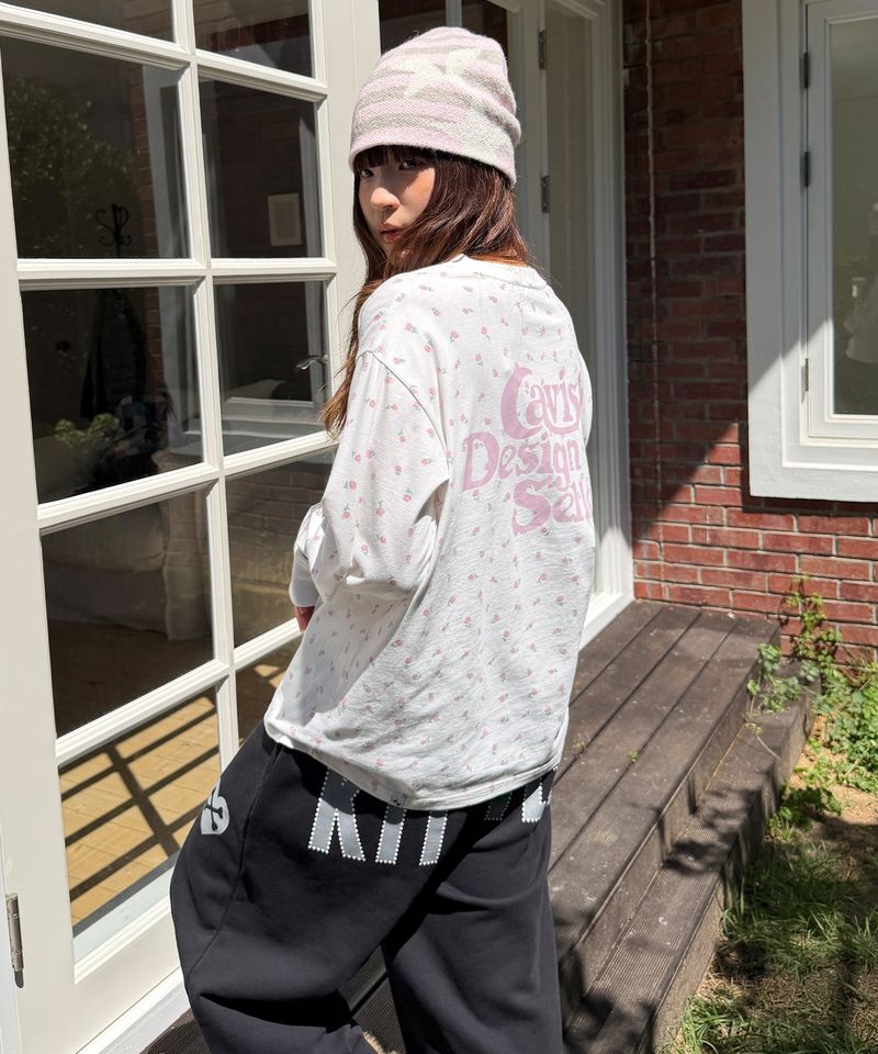 cavish（カビシ）の「フラワー セラー ロゴ LS Tシャツ ホワイト(PINK)(CV2GSUT551A)（トップス）」