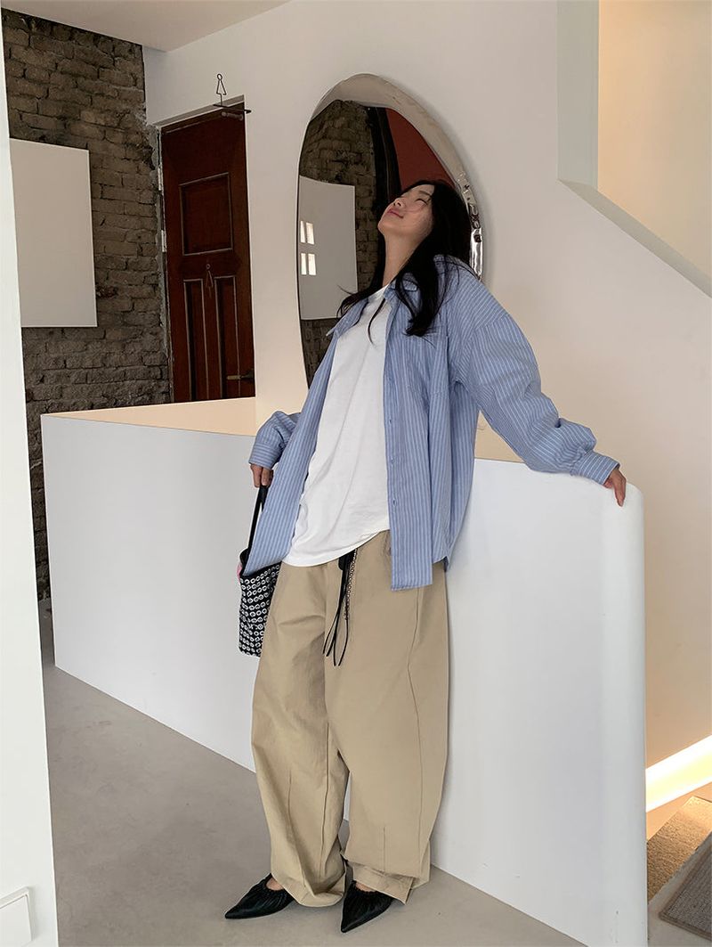 CURVED TUCK COTTON TROUSER