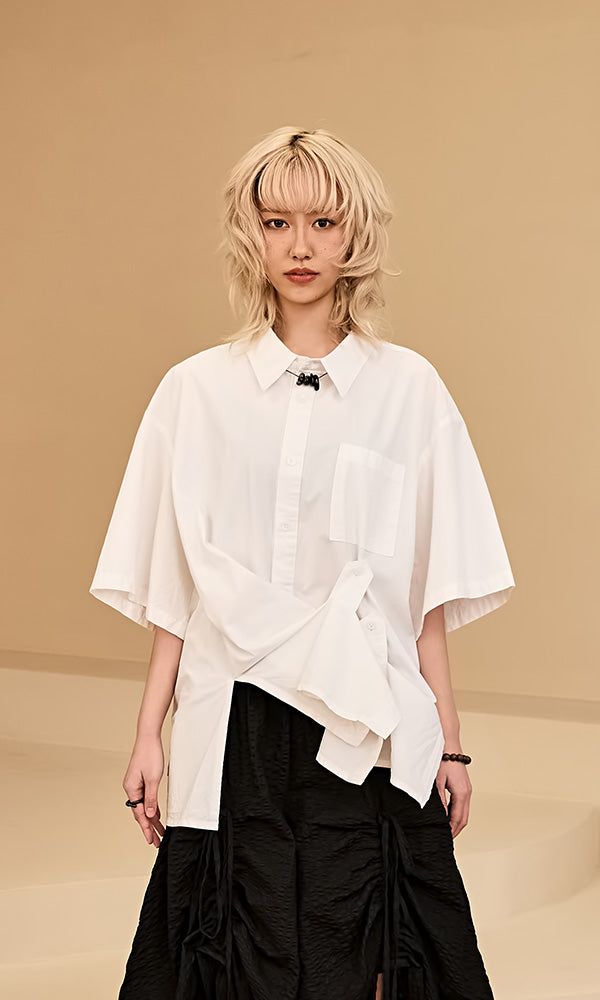Reculer（ルキュレ）の「ビジューポイントショートスリーブシャツ アイボリー（トップス）」
