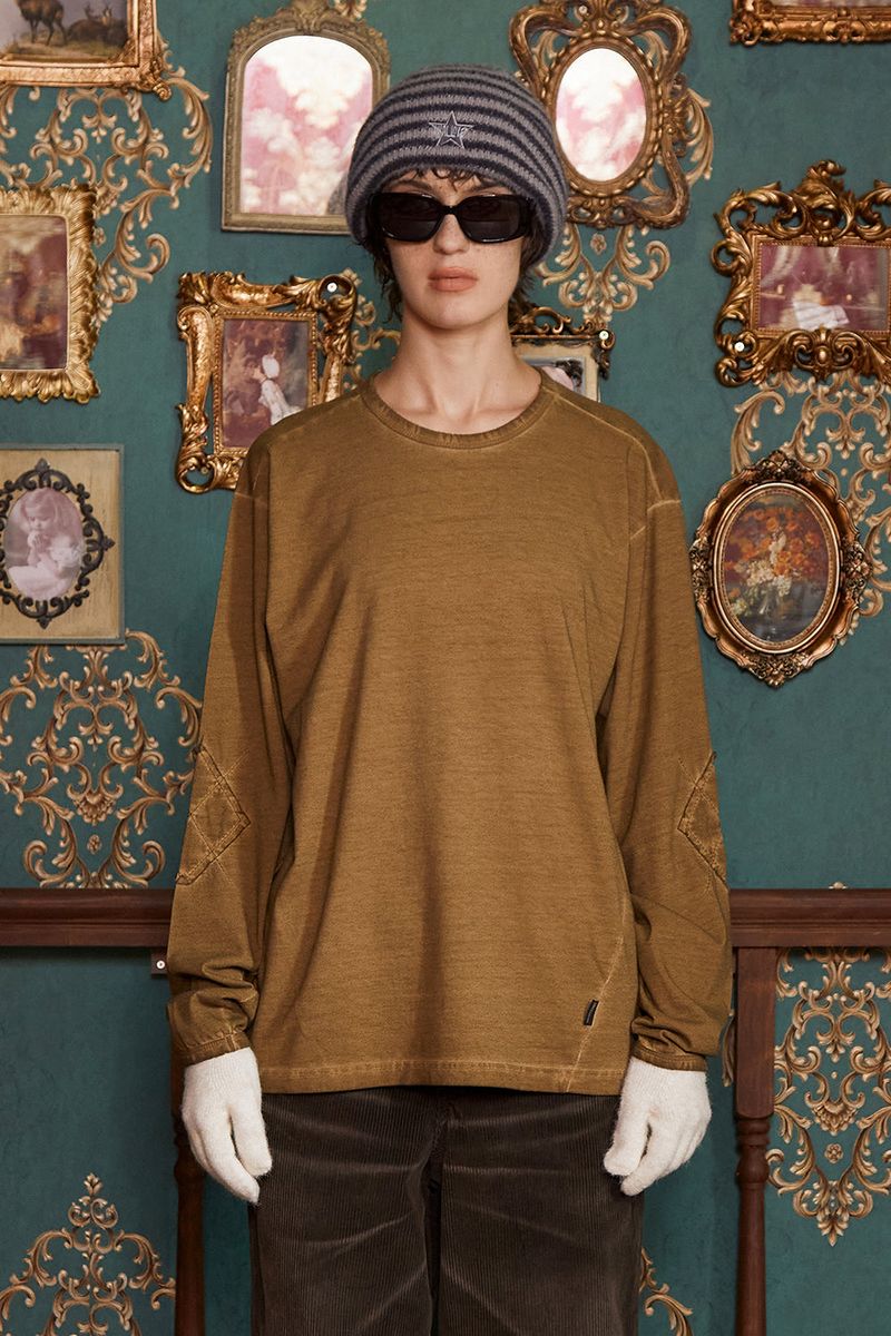 UNALLOYED（アナロイド）の「DYED ARGYLE LONG SLEEVE T SHIRT / OLIVE（Tops）」