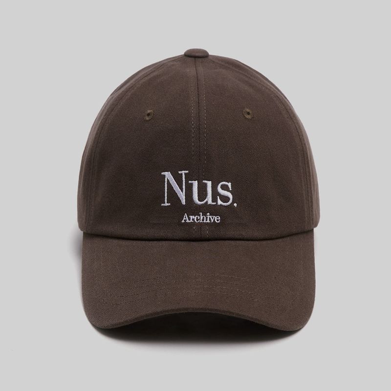 HUKE（フック）の「Nus. アーチボールキャップ（ブラウン）（帽子）」
