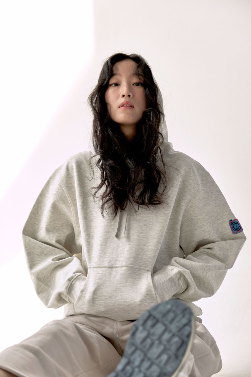 ALARMSEOUL（アラームソウル）の「ALARM OVERFIT HOODIE OATMEAL GRAY_UNISEX（Tops）」