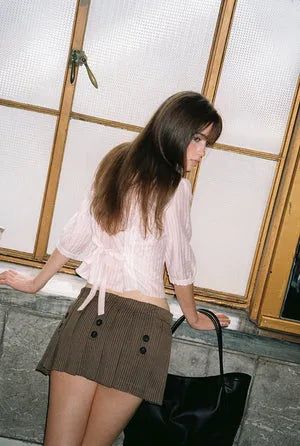 threetimes（スリータイムズ）の「ボタンプリーツスカート ブラウン（スカート）」
