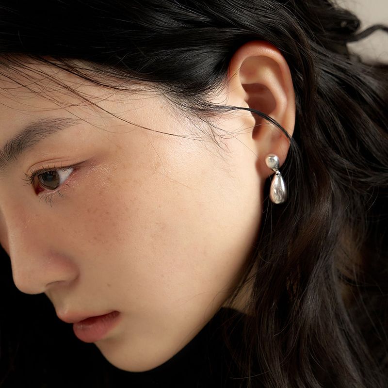 geegee(ジジ)の「double tear earring - silver(Accessories)」