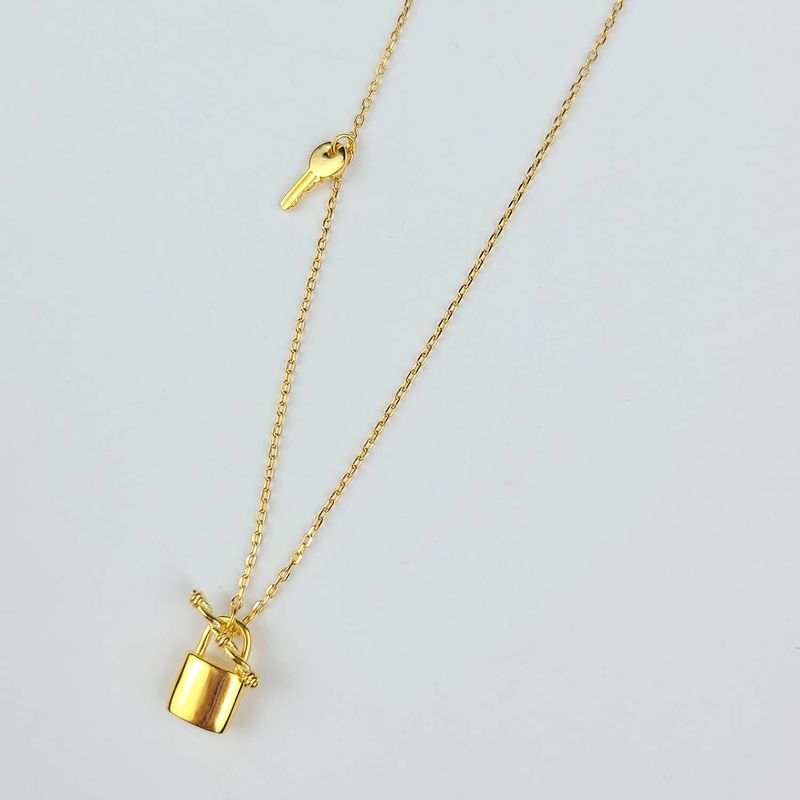 Petit lock & key necklace