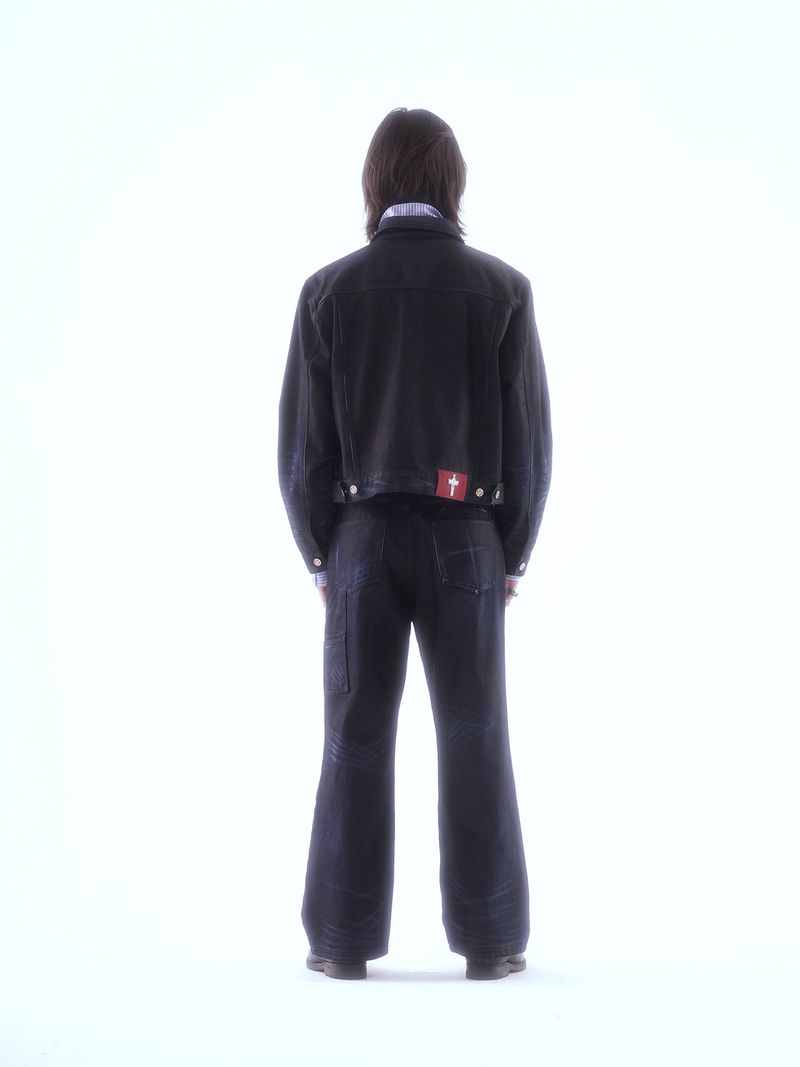 COATED KNIFE-SCRAPED HAND-WIPED DISTRESSED BOOTCUT JEANS