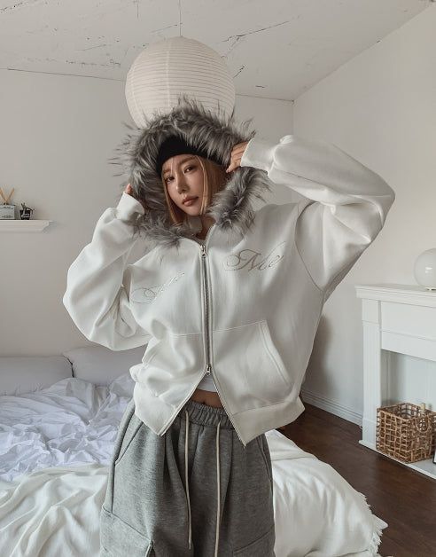 ULAN（ユレン）の「Bite lettering raccoon fur hood zip-up（Tops）」