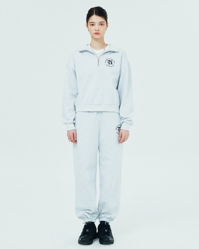 NCOVER（エンカバー）の「ROMAN TYPO LOGO TRAINING PANTS-WHITE MELANGE（Pants）」