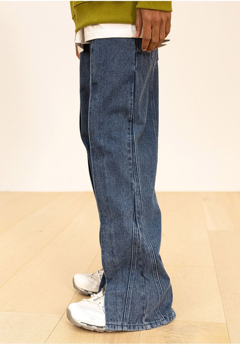 INCISION INVERTED WASHED DENIM PANTS