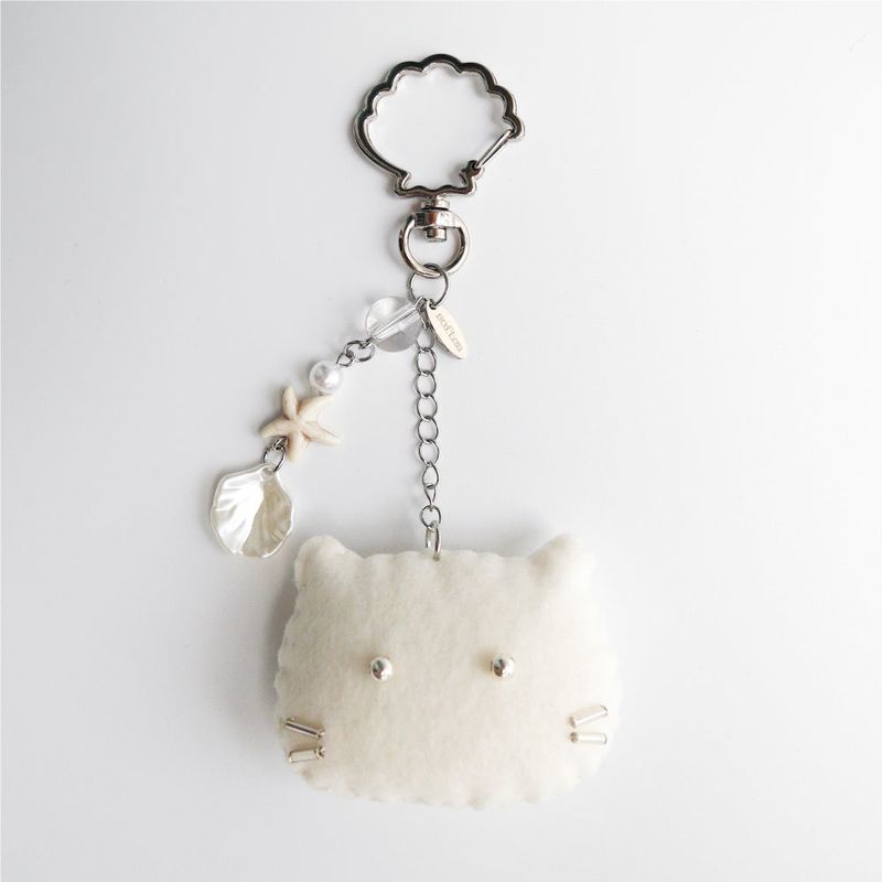 soften（ソプン）の「[soft keyring] シーサイドキャット (アイボリー)（トイ/キーホルダー）」