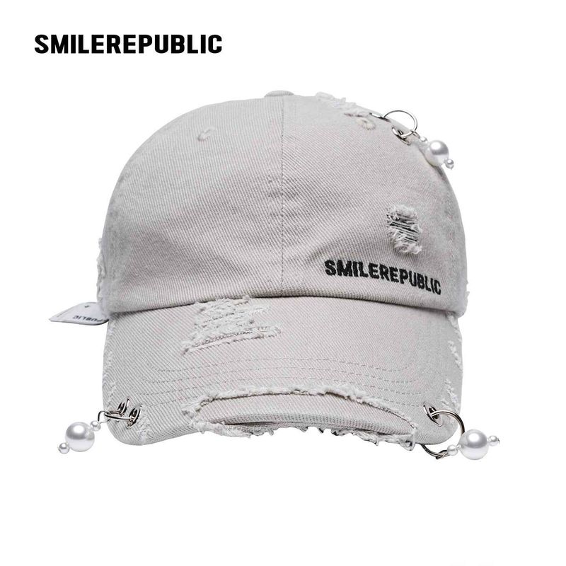 White Distressed Baseball Cap with Pearl Charm Accents, Logo Embroidery and Adjustable Strap