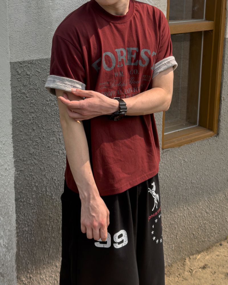 JIIGEUM（ジグム）の「トロピック ヴィンテージ ロールアップ ショートスリーブTシャツ（トップス）」