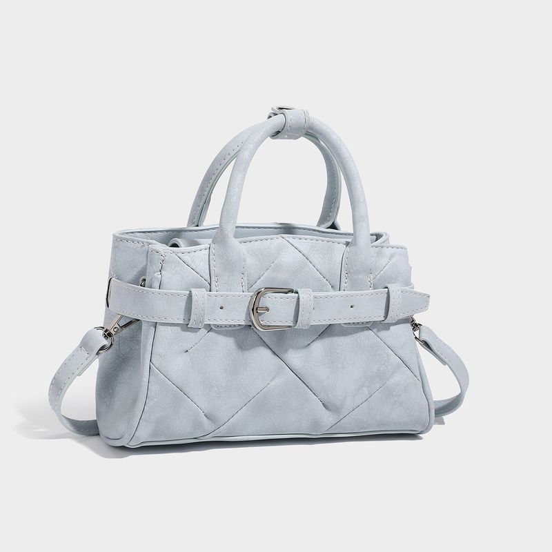 La mode MAQI（ラ モード マキ）の「Square quilted mini tote bag with silver buckle crossbody bag（Bags）」
