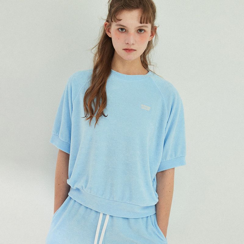 Between A and B（ビットウィーンエーアンドビー）の「テリー ラグラン Tシャツ_ブルー（トップス）」