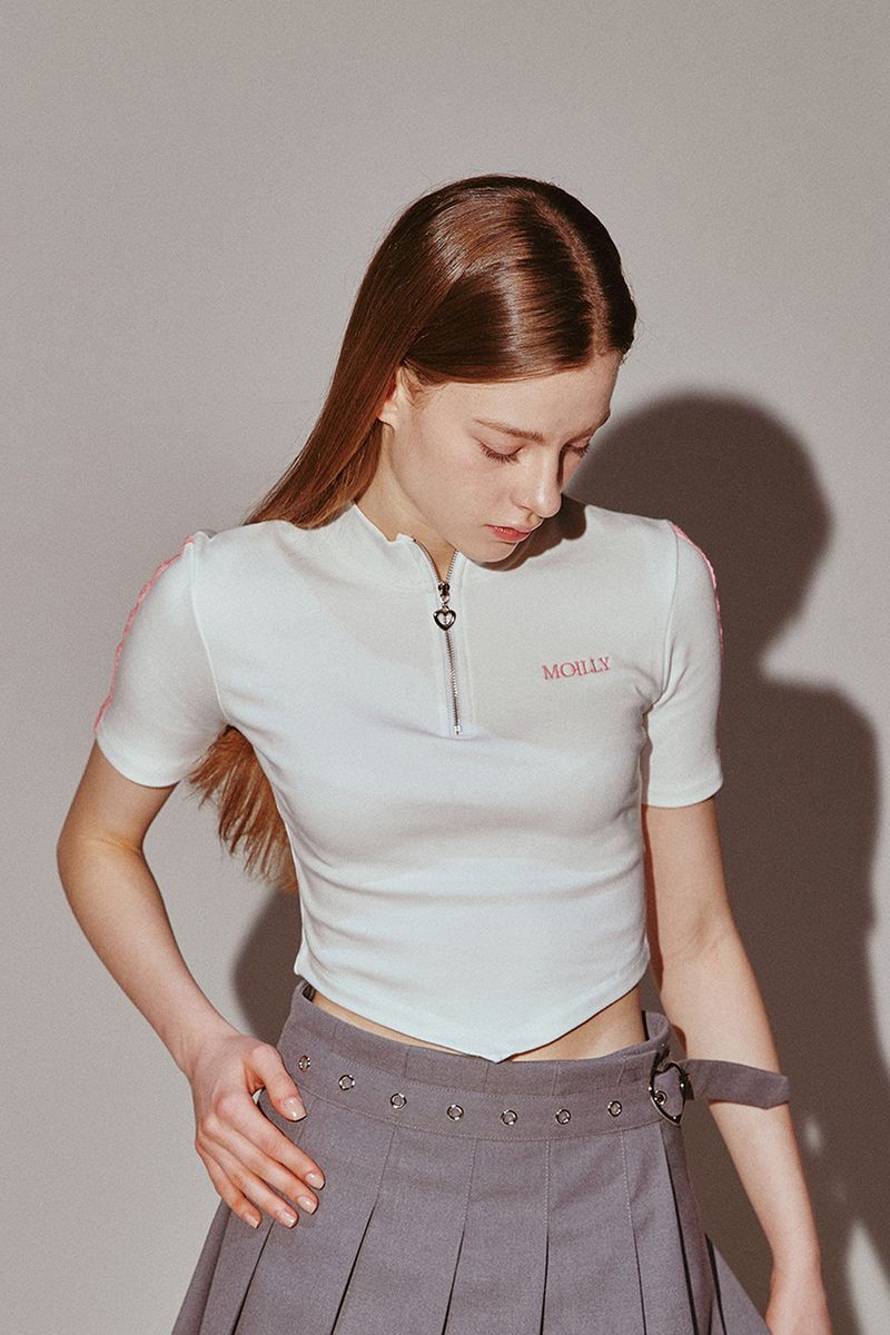 MOILLY(モイリー)の「Lace Tape Half Zip-Up Ivory(Tops)」