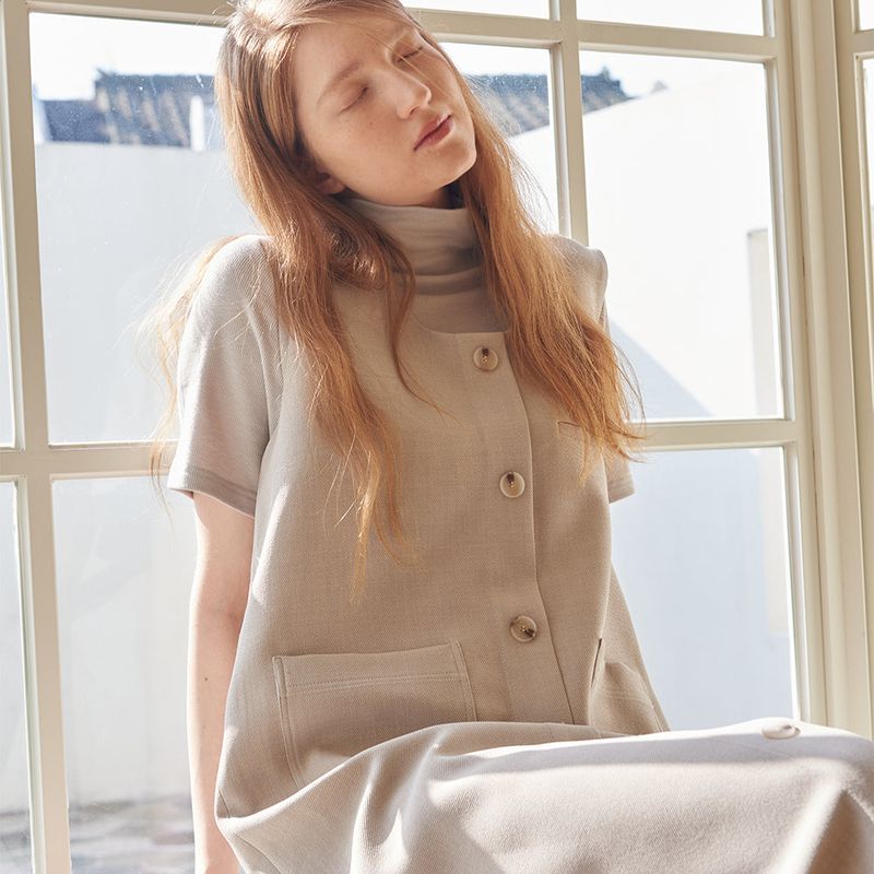CORCA（コルカ）の「Golgi Half Pola Tee Beige（Tops）」