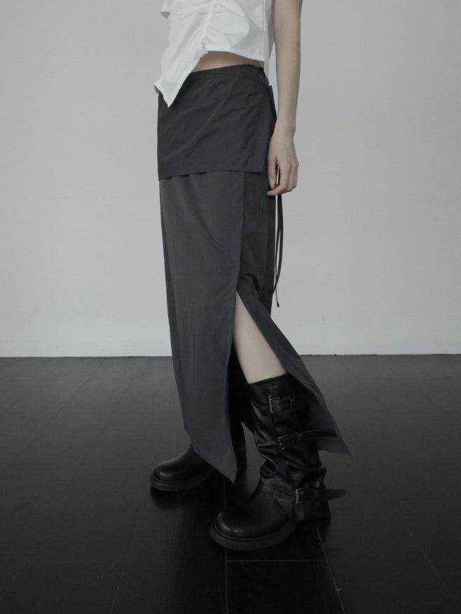 mnem（ムネム）の「E-Sen Layered Wrap Skirt（Skirts）」