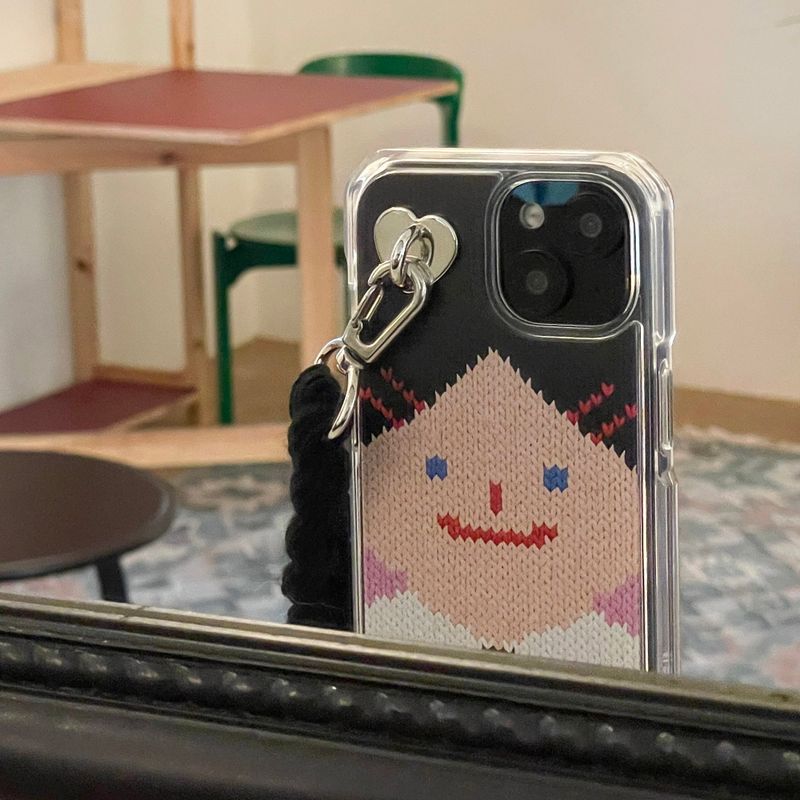 DELPHIN(デルフィン)の「スマイリーフェイスハードジェルケース - VER.2 (+HAIR KEYRING SET) - ブラック(スマホグッズ/小物)」