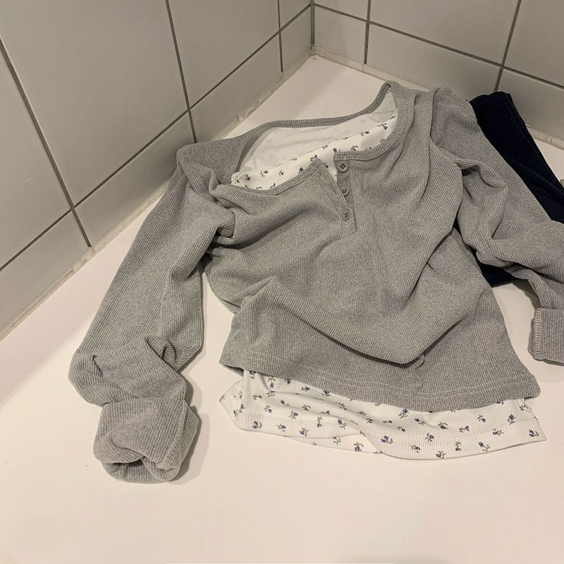 BEIDELLI（ベイデリー）の「フラワーレースボタンレイヤードTシャツ（トップス）」