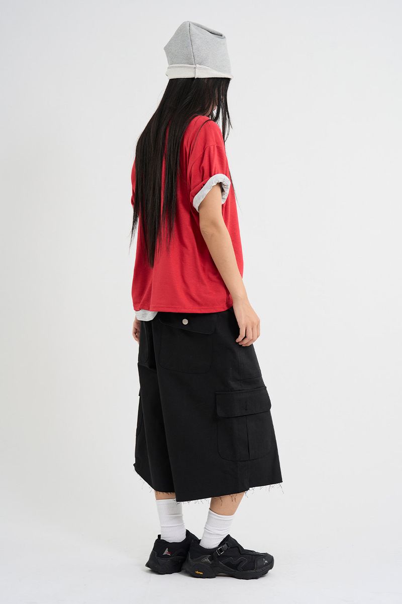 Rough-cut Bermuda shorts