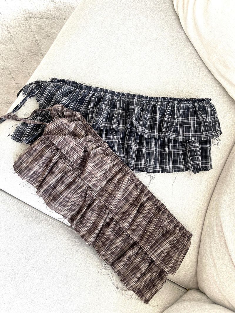 Seow(ソウ)の「1490. 체크 캉캉 프릴 레이어드 스커트 (2color)(Skirts)」