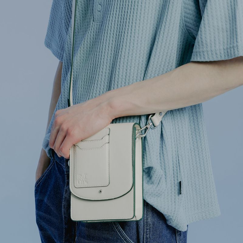 ROMANTIC CROWN（ロマンティッククラウン）の「RECENT LOGO CROSS BAG_OATMEAL（Bags）」